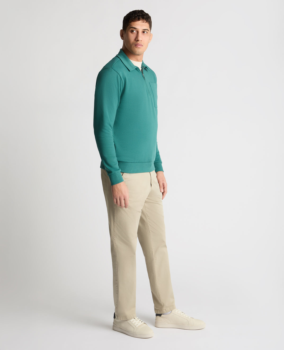 Man wearing a green jumper