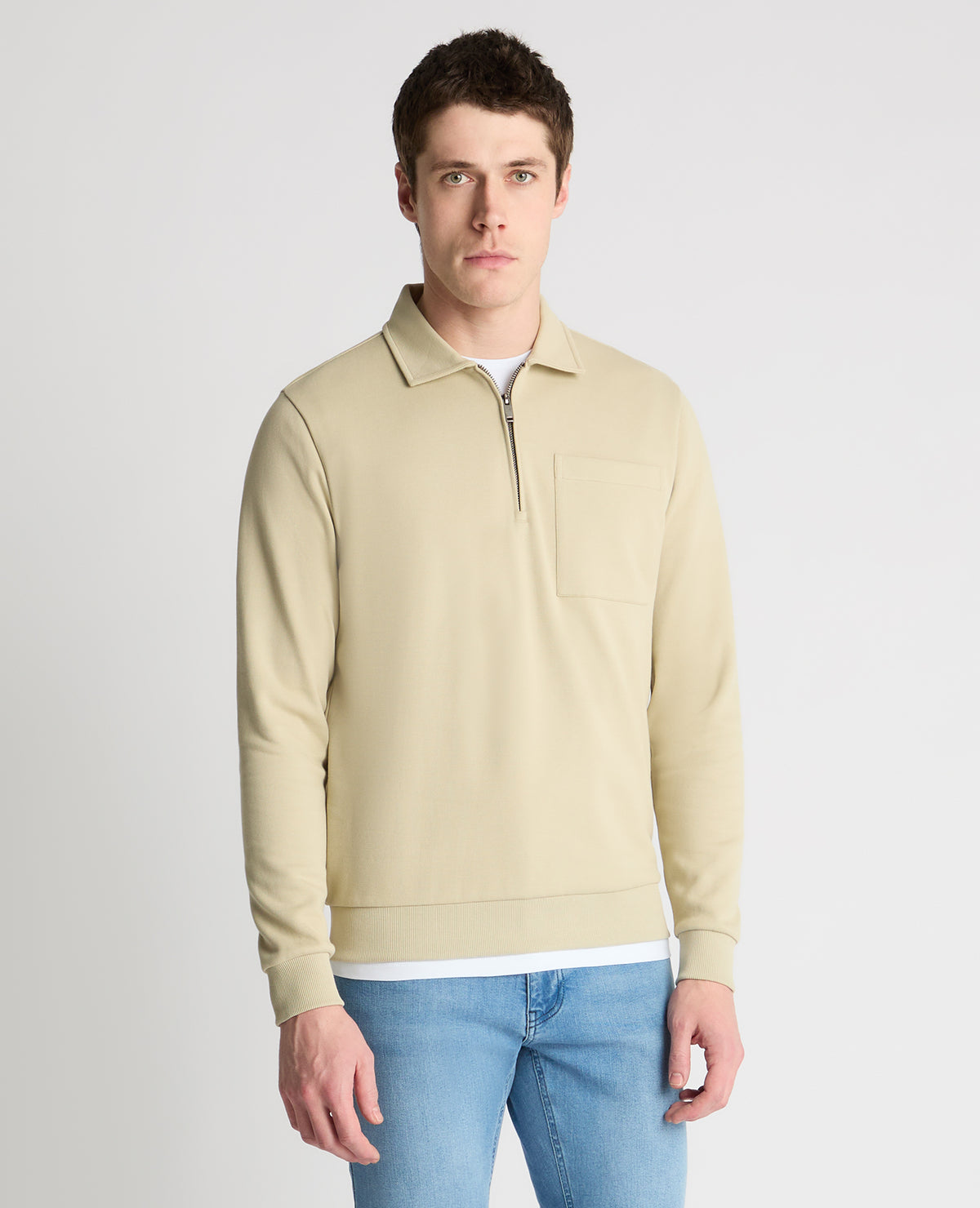 Man wearing a stone jumper