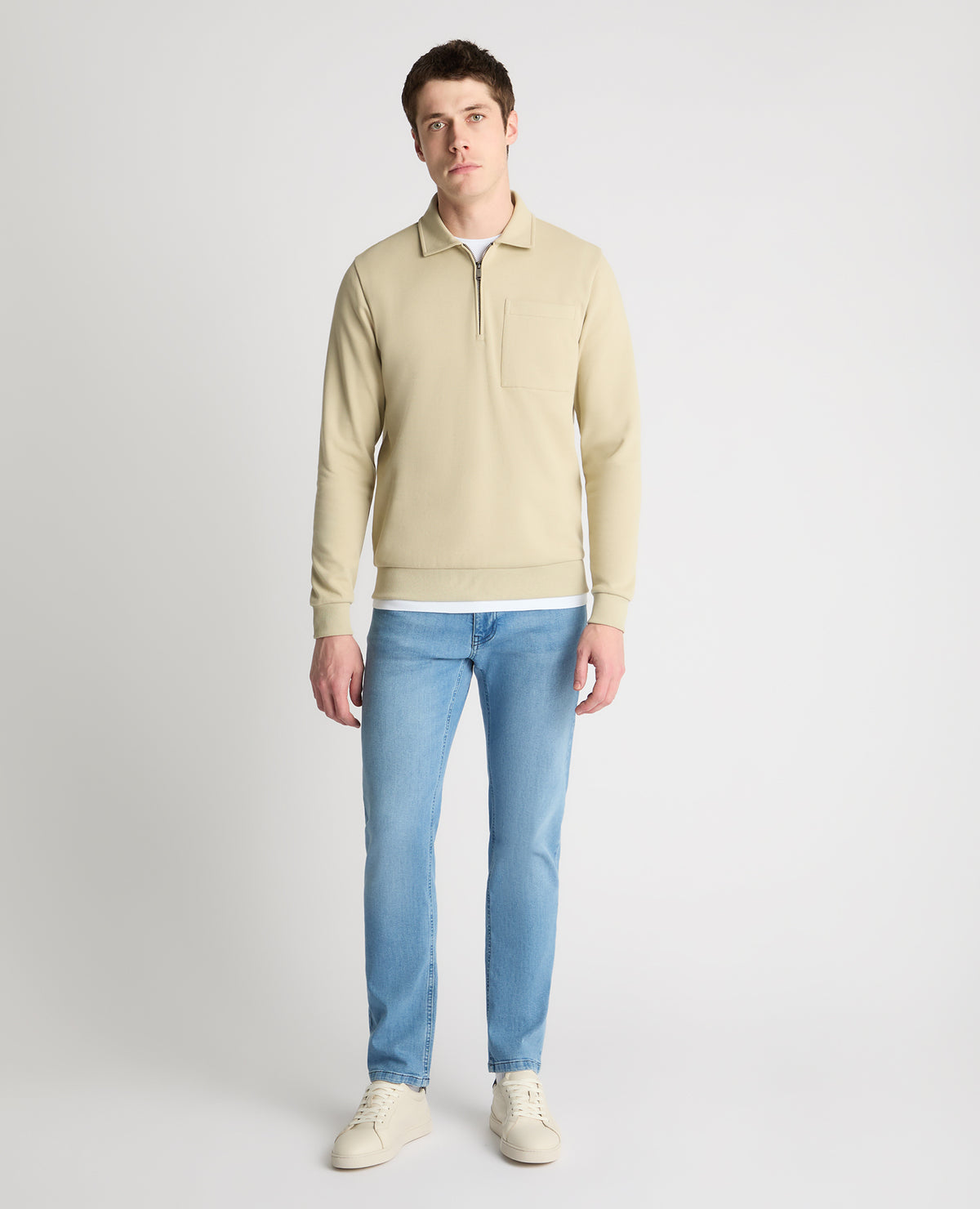 Man wearing a stone jumper