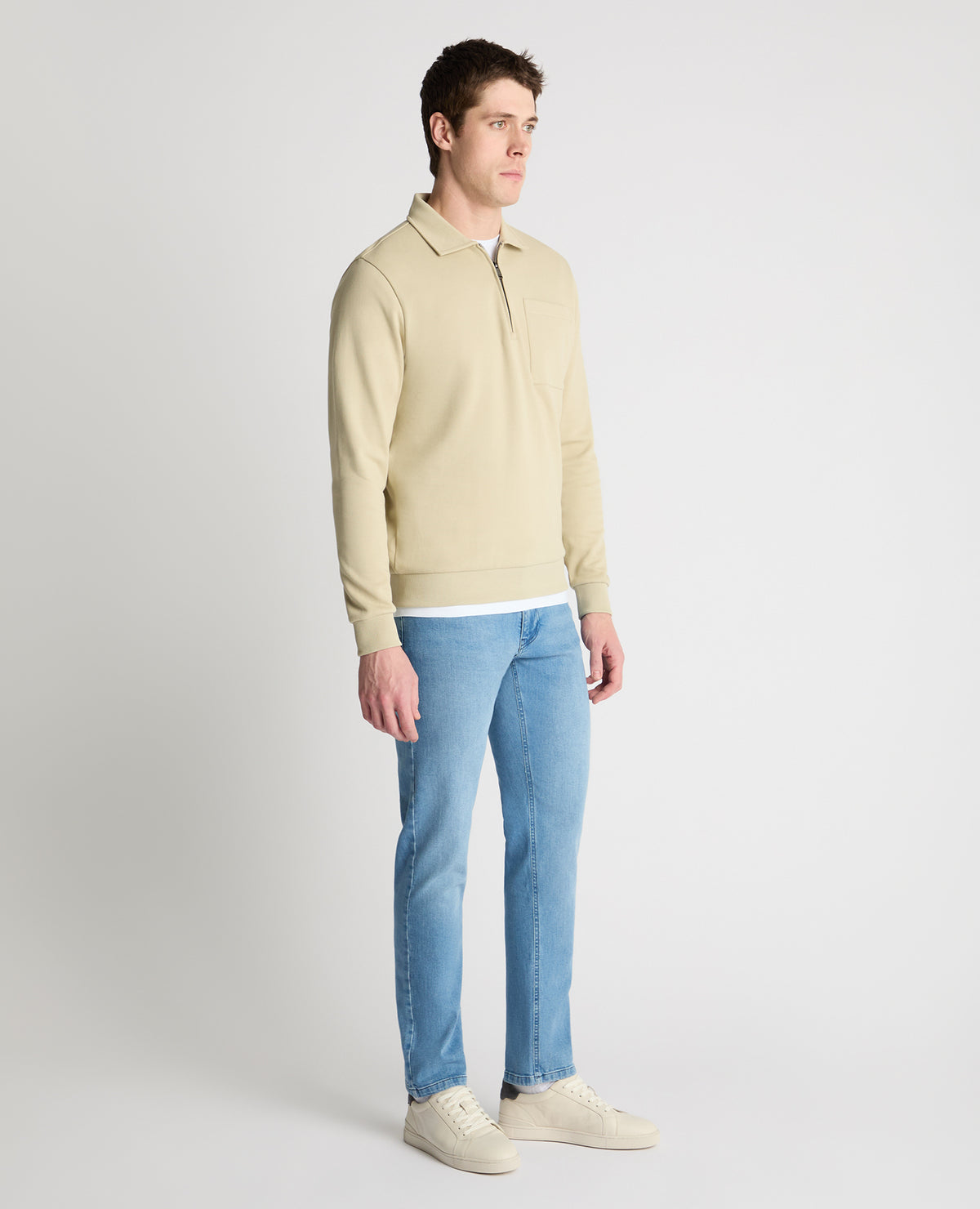 Man wearing a stone jumper