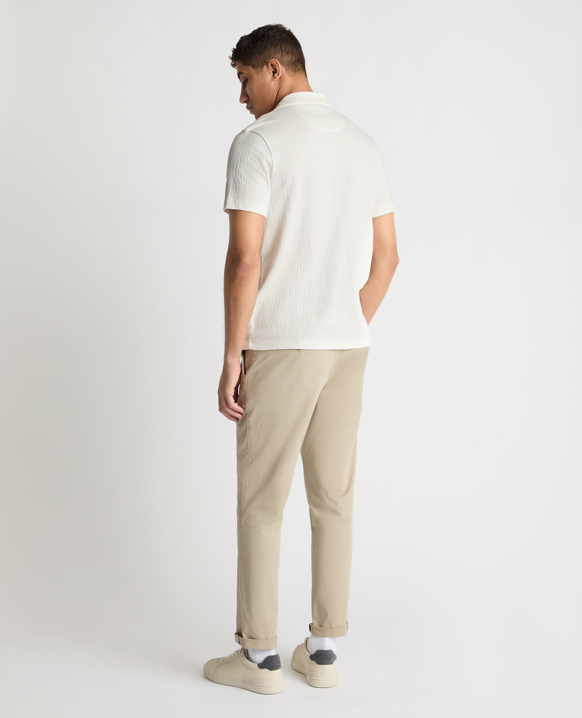 Man wearing a White jumper