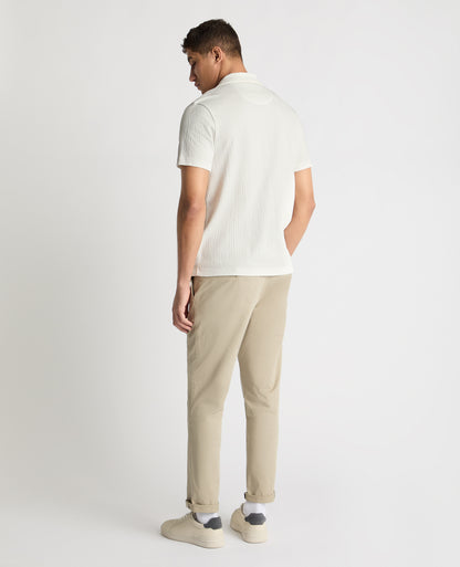 Man wearing a White jumper