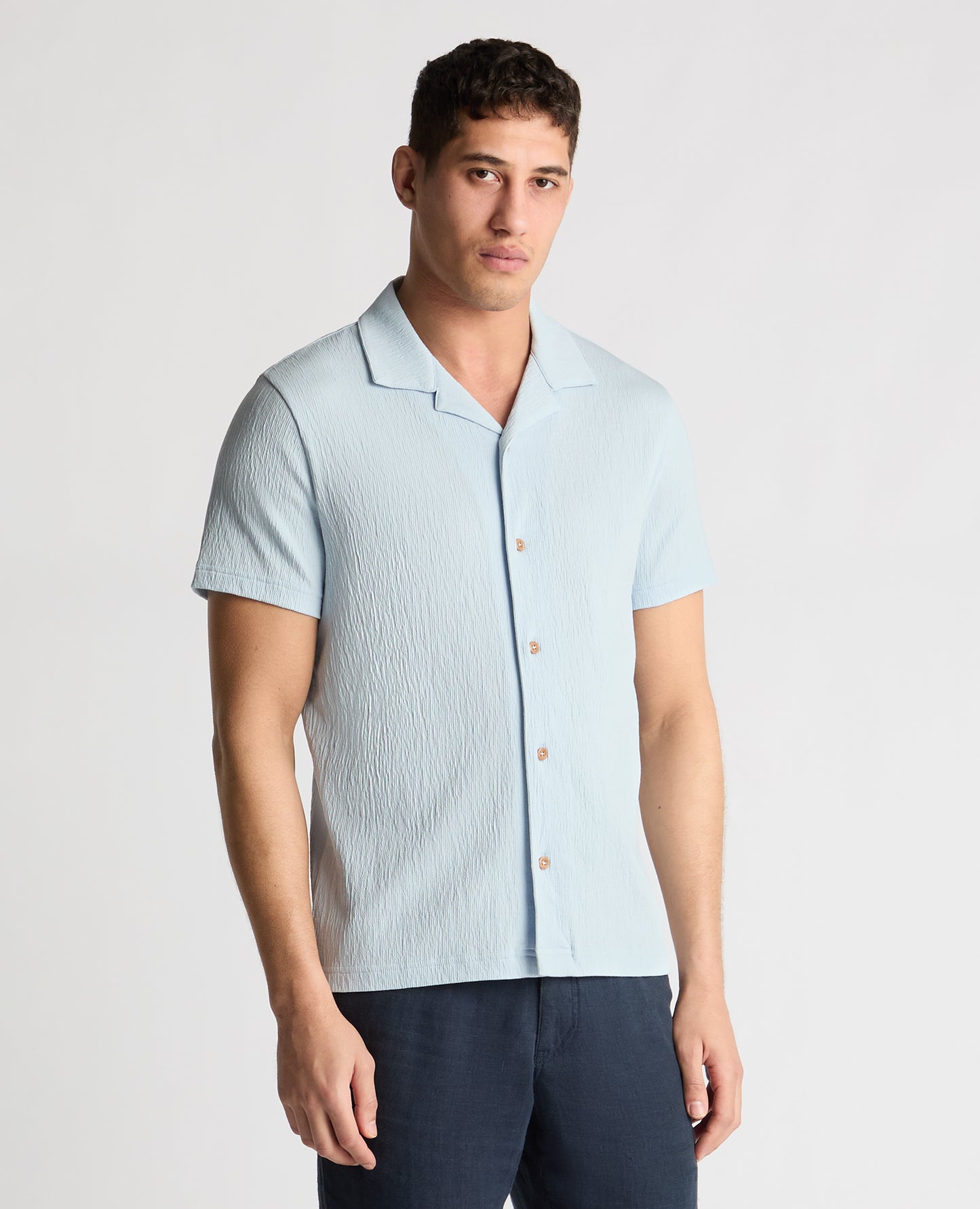 Man wearing a blue jumper