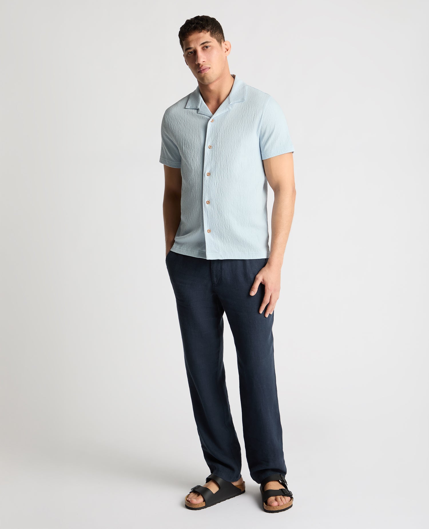 Man wearing a blue jumper