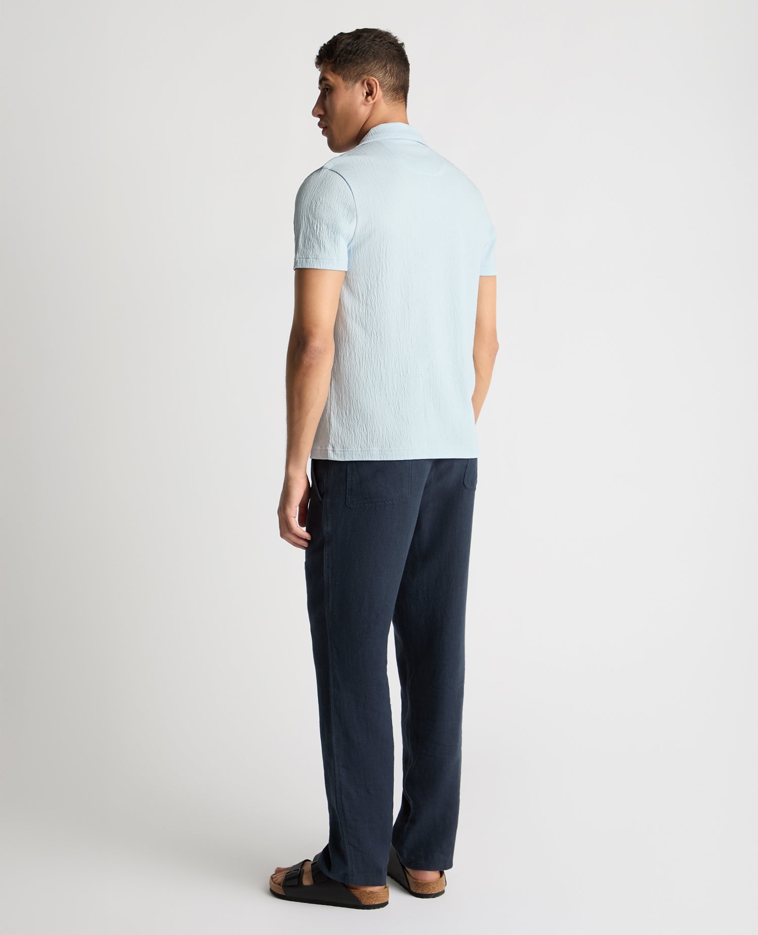 Man wearing a blue jumper