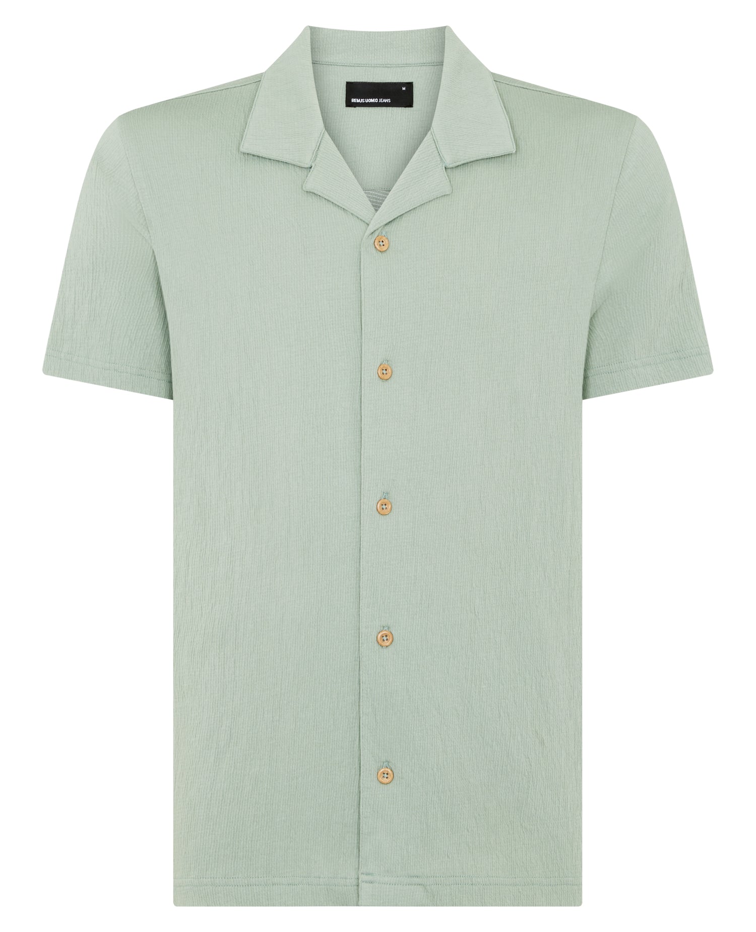 Man wearing a green jumper