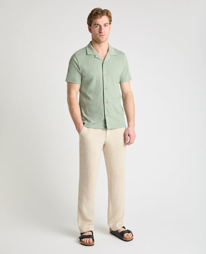 Man wearing a green jumper