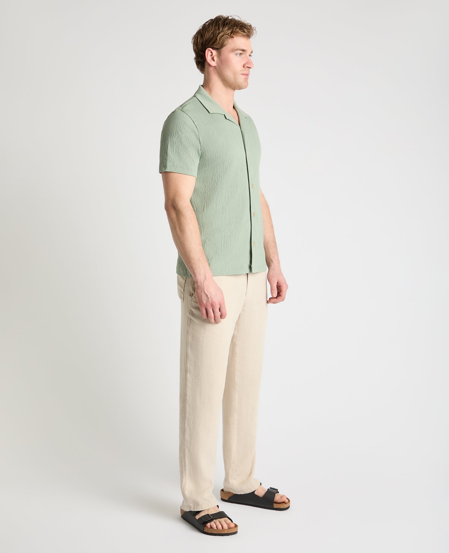Man wearing a green jumper