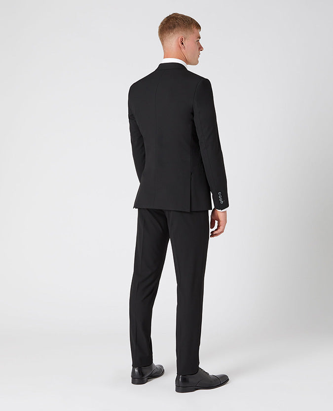 Man wearing a black X-Slim Fit Polyviscose Stretch Mix and Match Suit