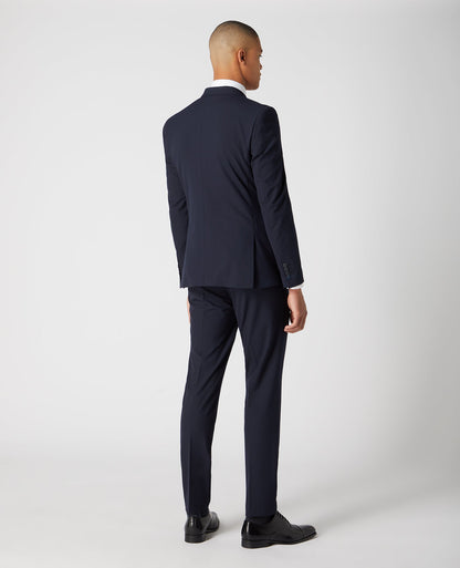 Man wearing a navy X-Slim Fit Stretch Mix and Match Suit