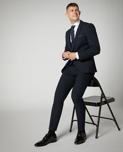 Man wearing a navy X-Slim Fit Stretch Mix and Match Suit