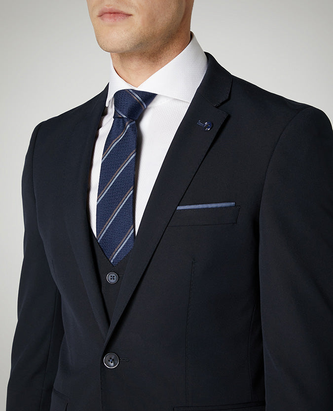 Man wearing a navy X-Slim Fit Stretch Mix and Match Suit