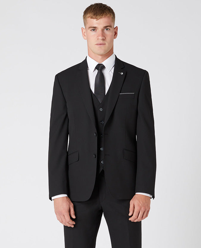 Man wearing a black Tapered Fit Stretch Mix and Match Suit