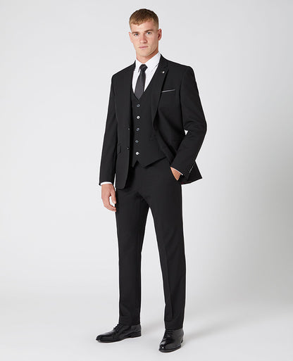 Man wearing a black Tapered Fit Stretch Mix and Match Suit