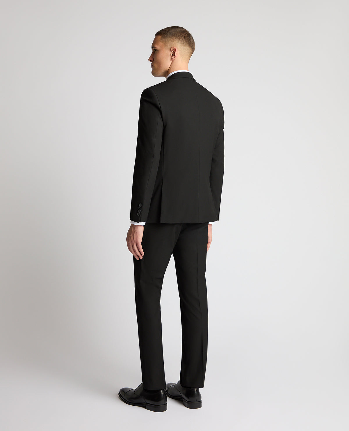 Man wearing a Black suit