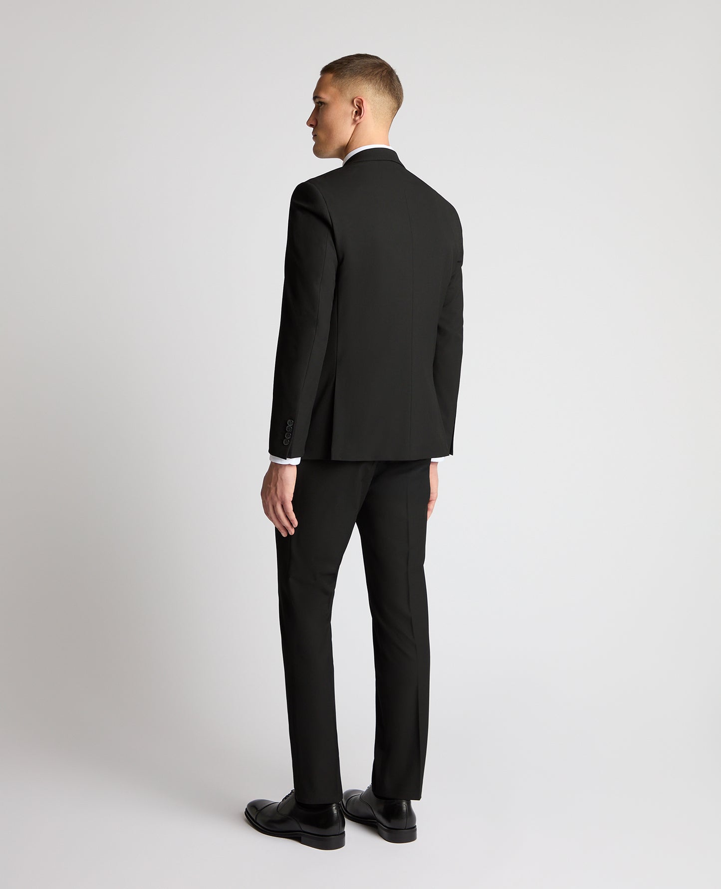 Man wearing a Black suit