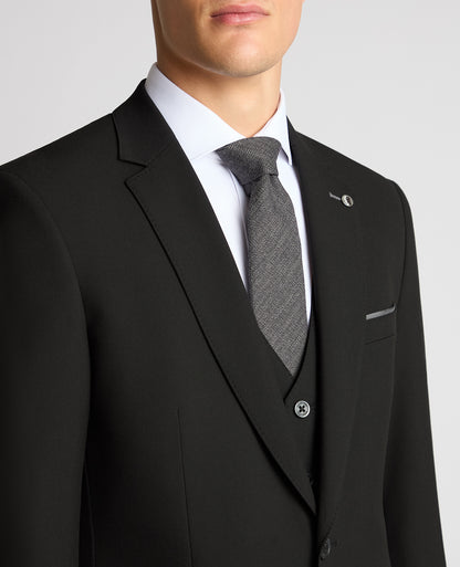 Man wearing a Black suit