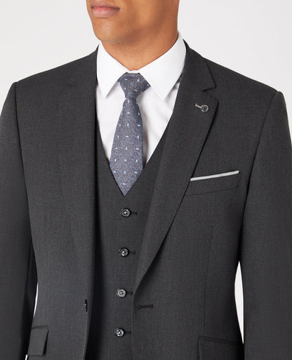 Man wearing a grey Tapered Fit Stretch Mix and Match Suit Jacket