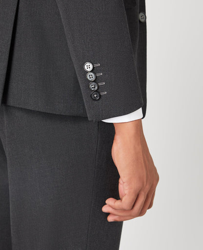Man wearing a grey Tapered Fit Stretch Mix and Match Suit Jacket