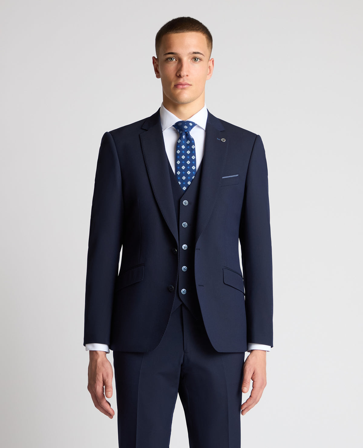 Man wearing a navy suit