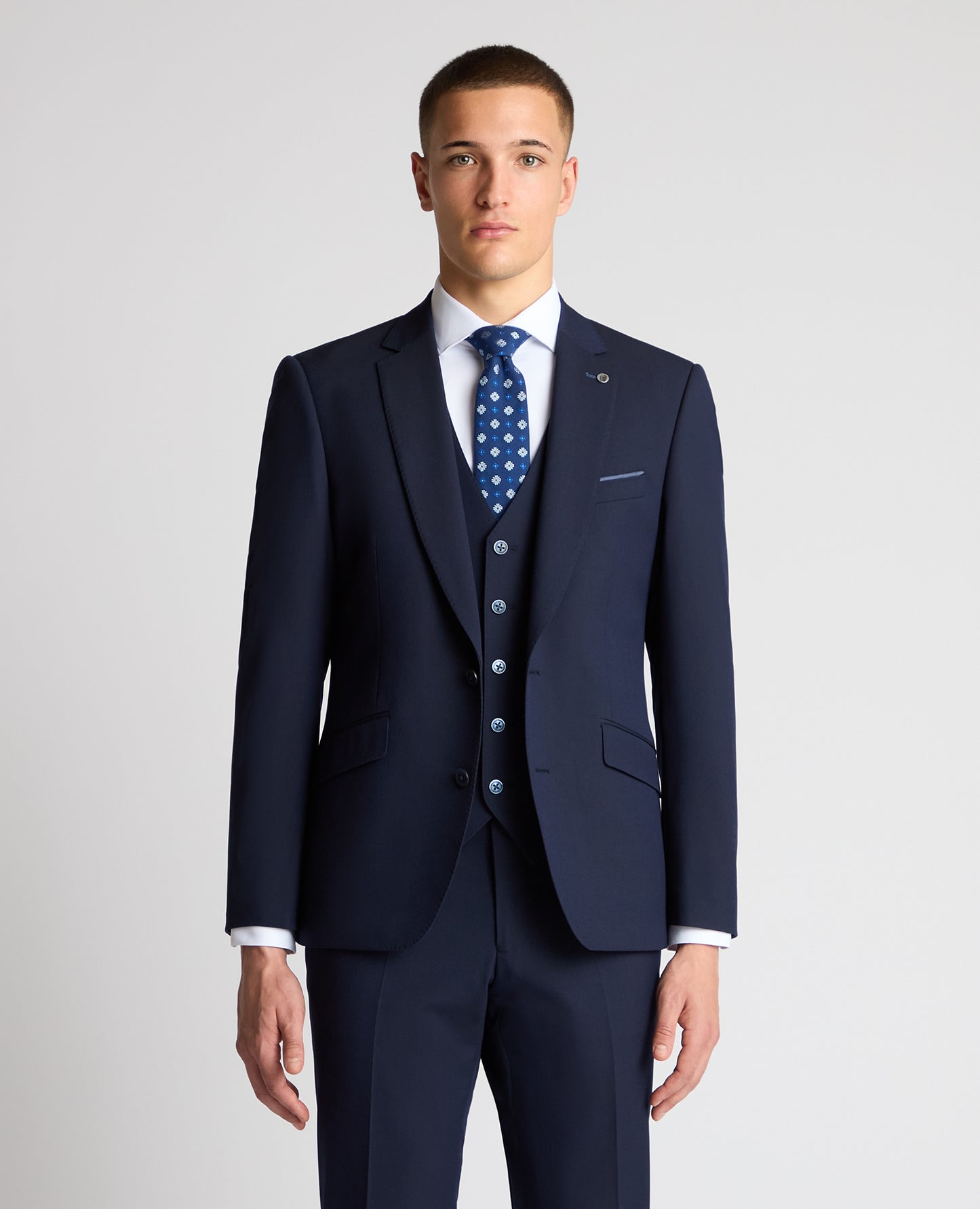 Man wearing a navy suit