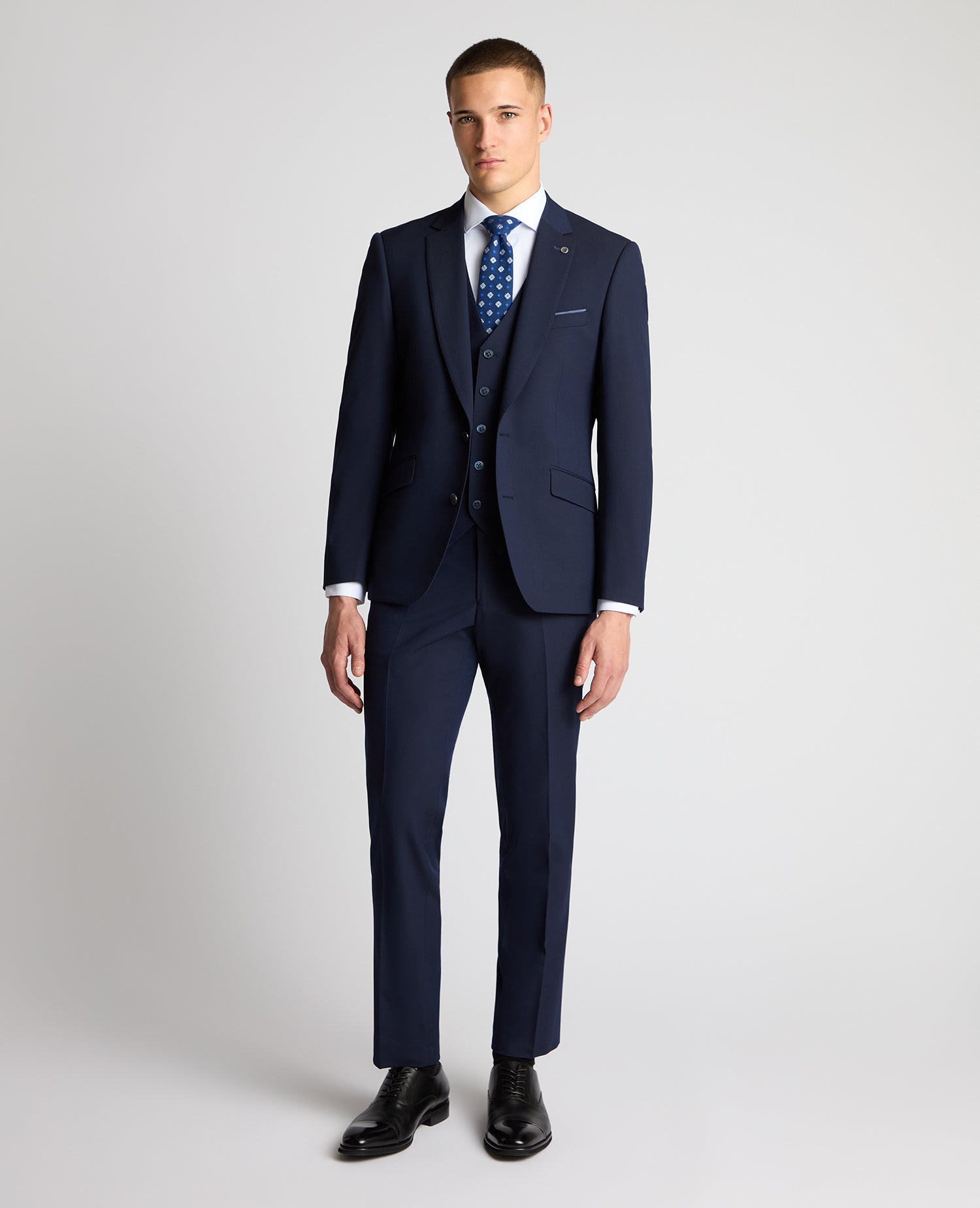Man wearing a navy suit