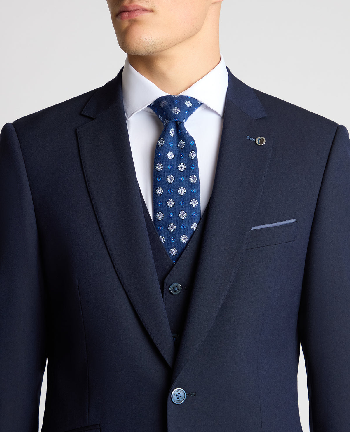 Man wearing a navy suit