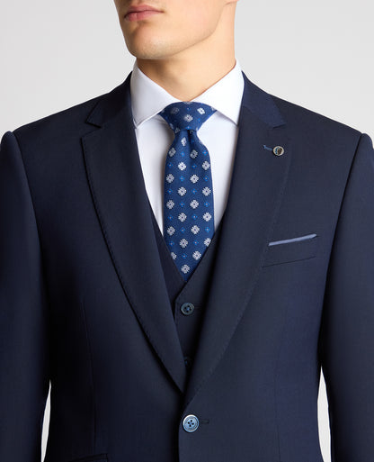 Man wearing a navy suit