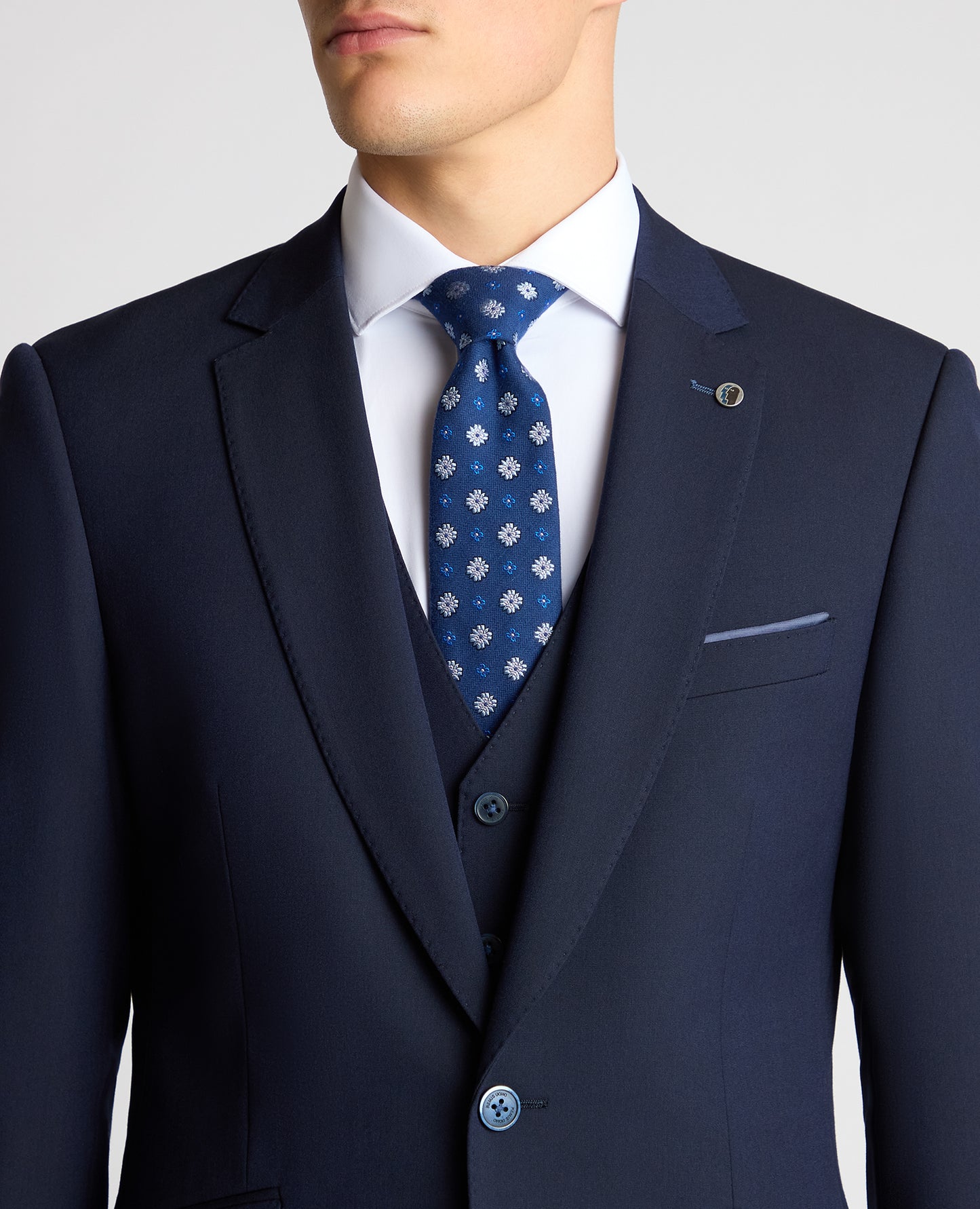 Man wearing a navy suit