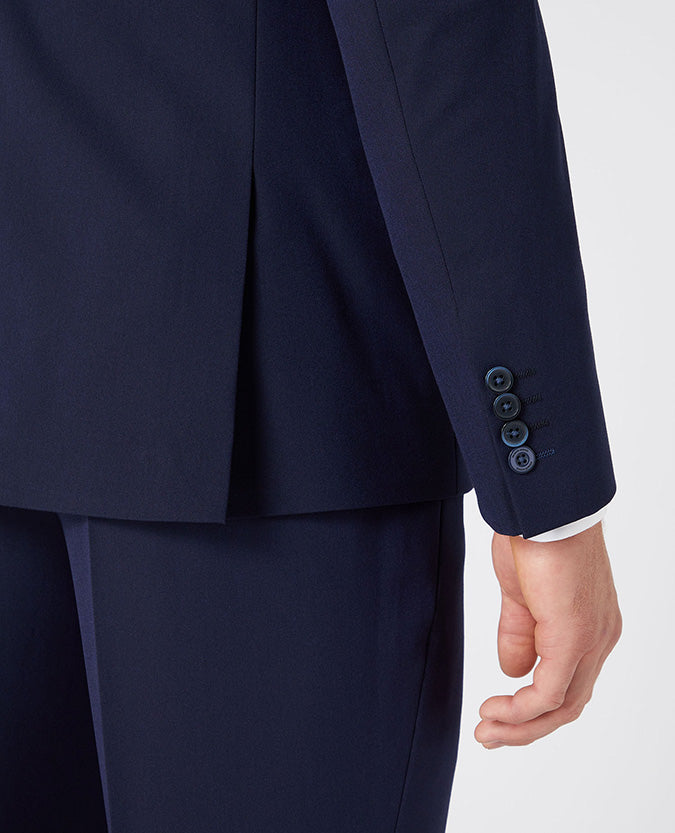 Man wearing a navy Tapered Fit Stretch Mix and Match Suit