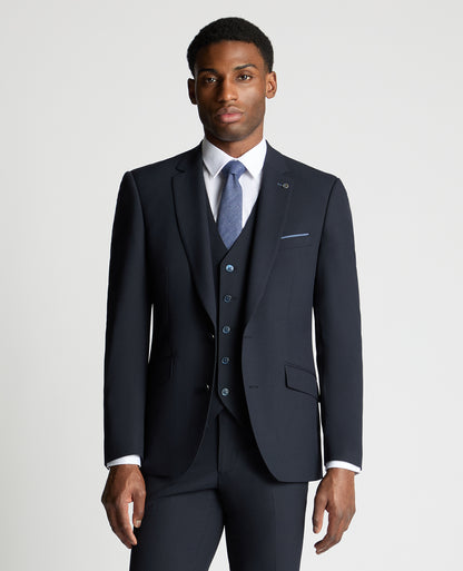 Man wearing a navy suit