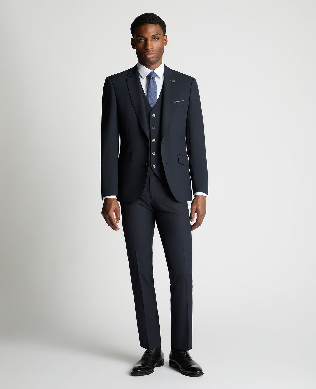 Man wearing a navy suit