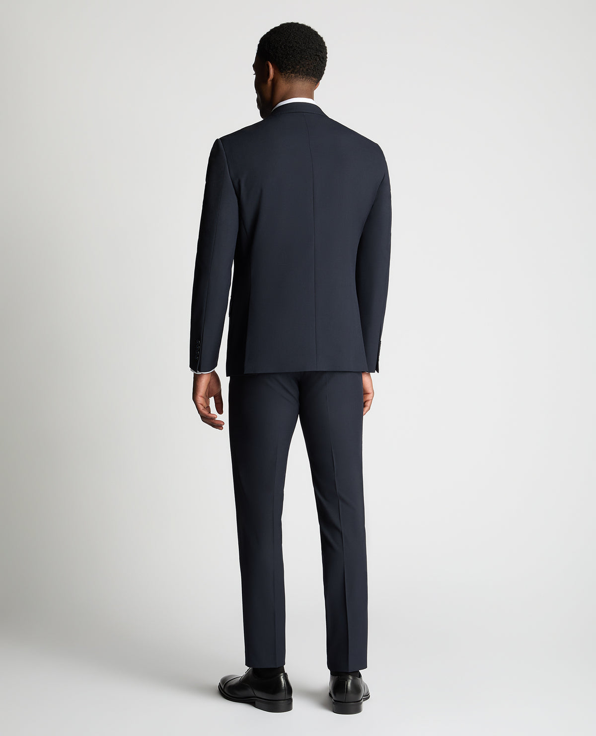 Man wearing a navy suit