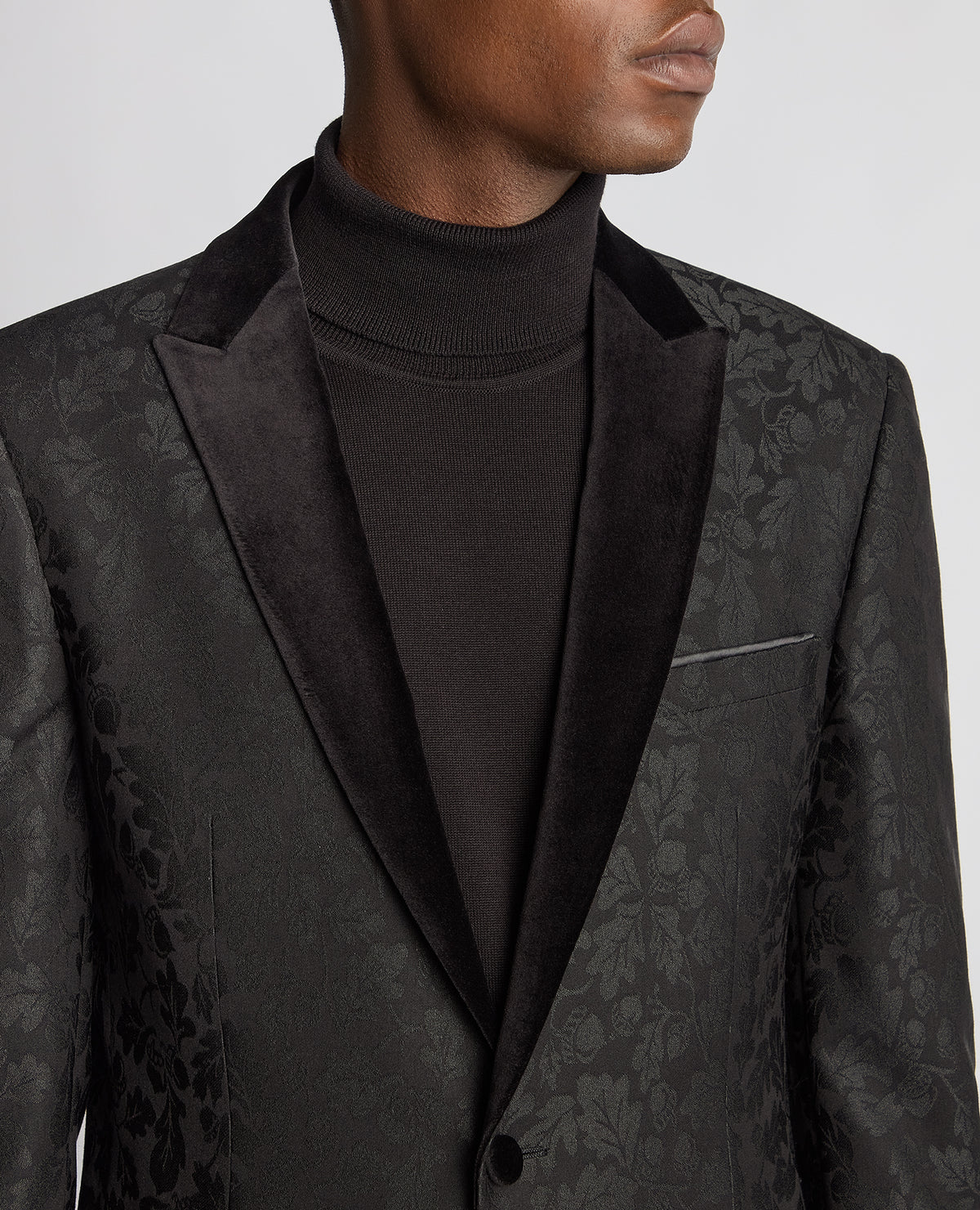 Man wearing a black Slim Fit Floral Dinner Jacket