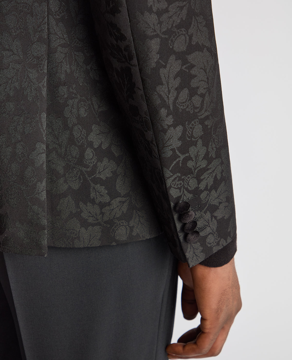 Man wearing a black Slim Fit Floral Dinner Jacket