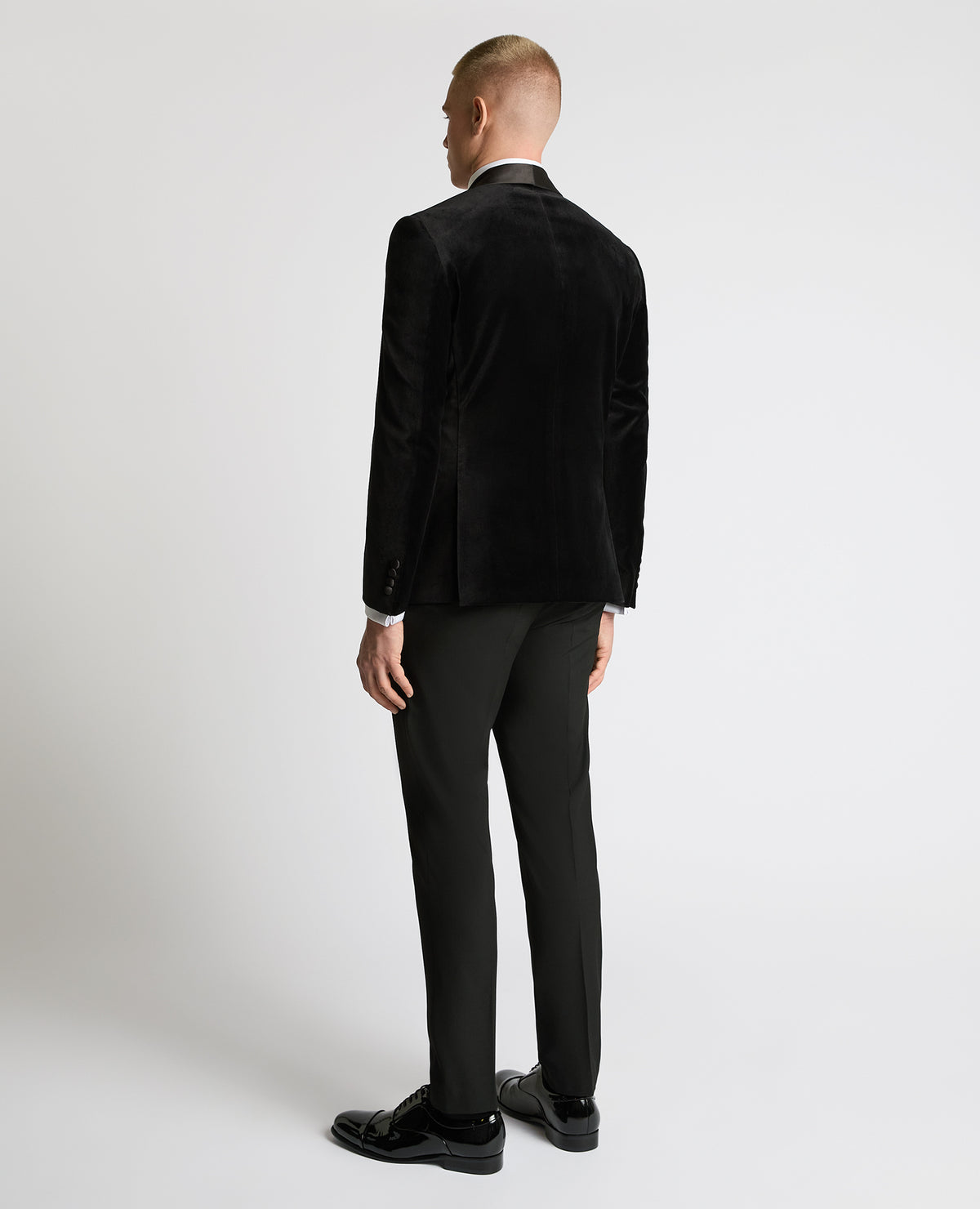 Man wearing a black Slim Fit Velvet Dinner Jacket