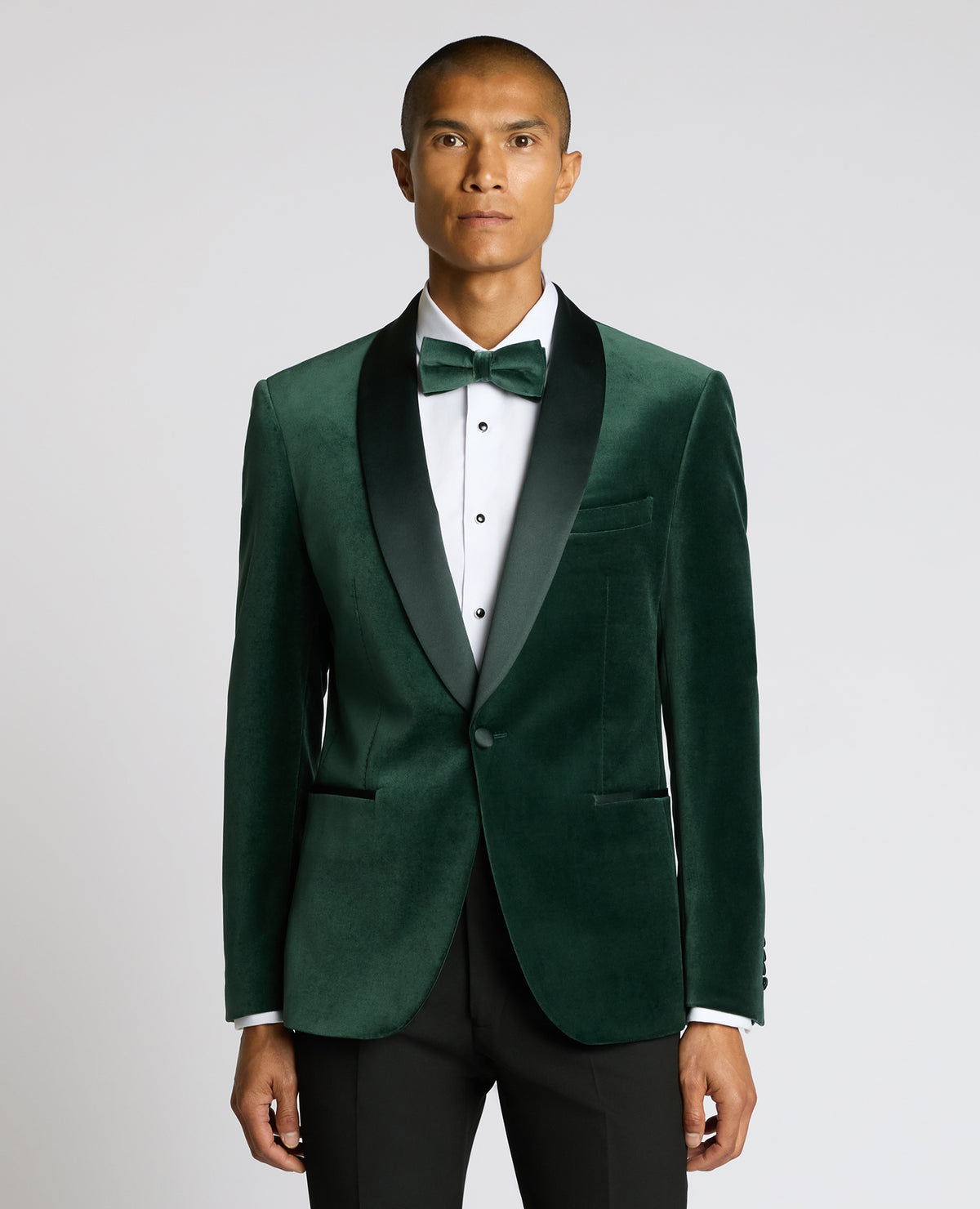 Man wearing a green suit