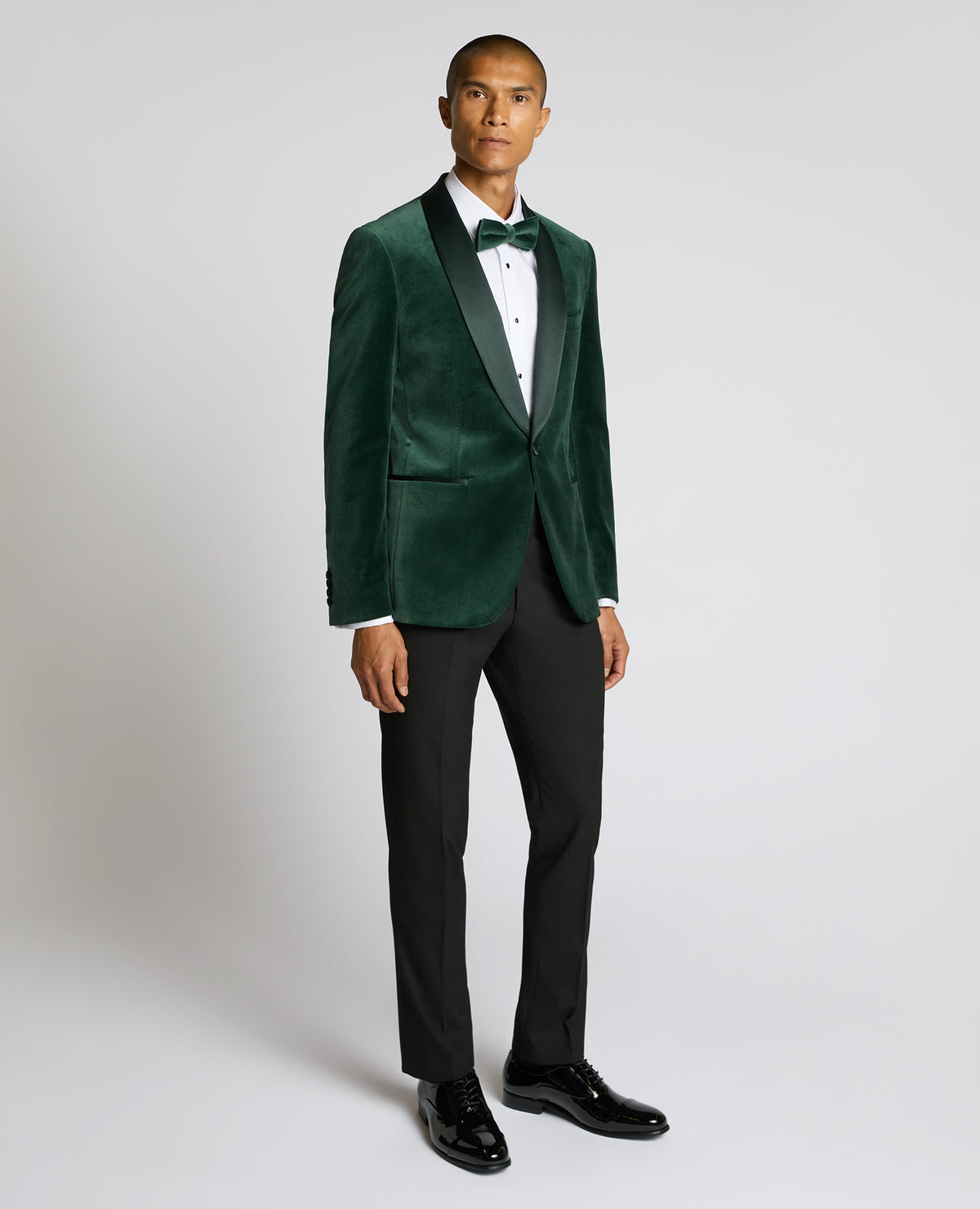 Man wearing a green suit