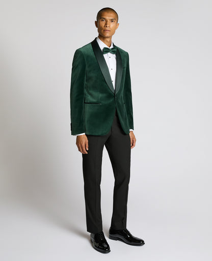 Man wearing a green suit