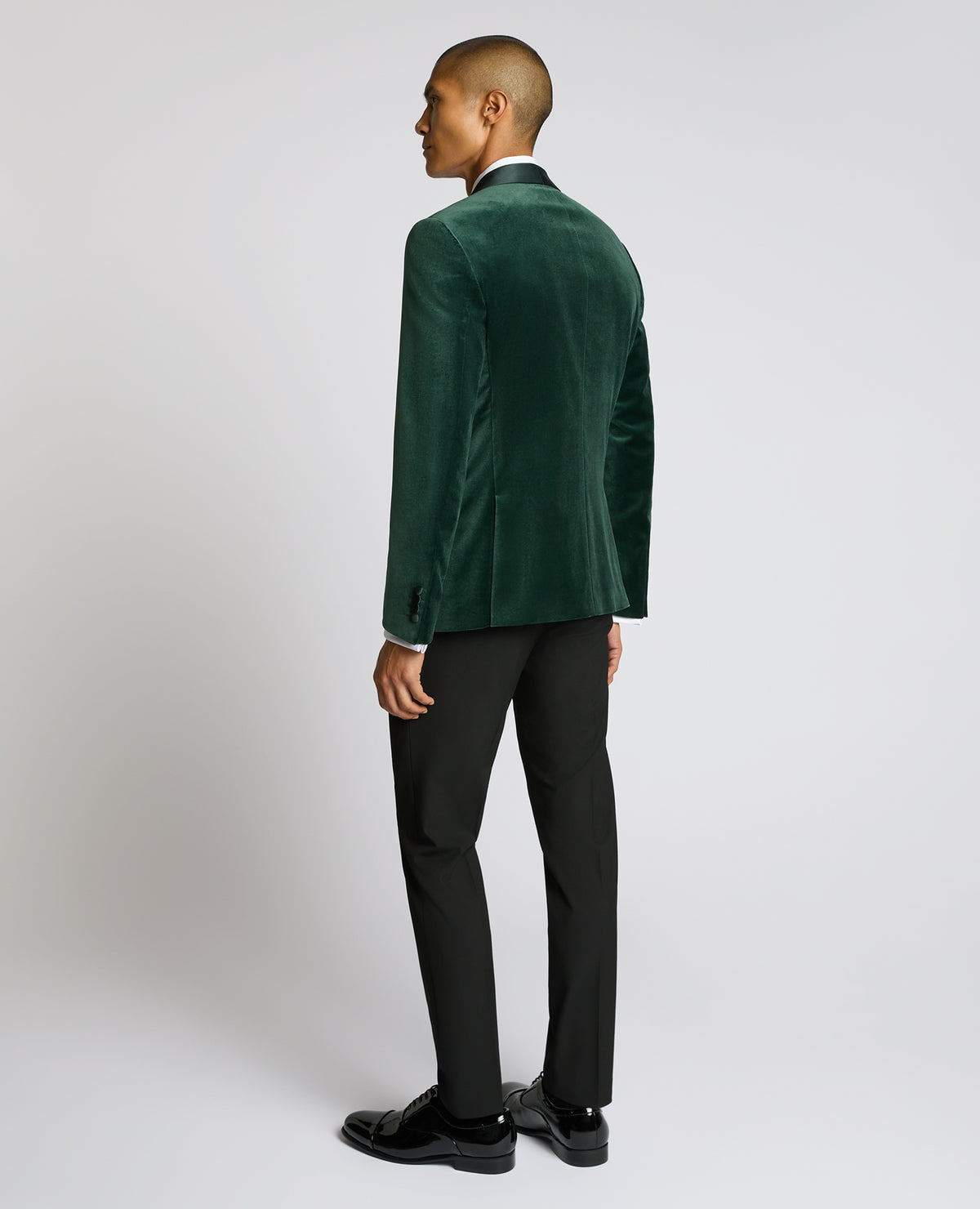 Man wearing a green suit