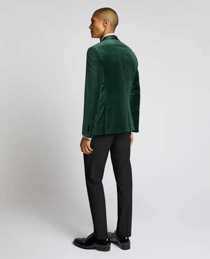 Man wearing a green suit