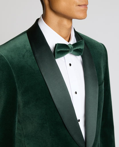 Man wearing a green suit