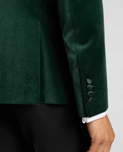 Man wearing a green suit