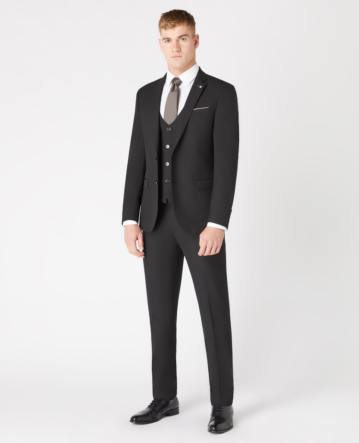 Man wearing a black Slim Fit Stretch Mix and Match Suit