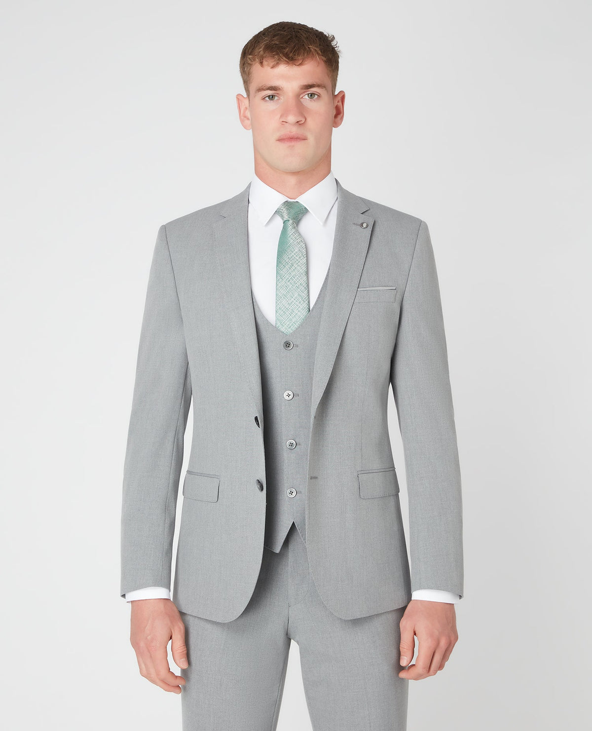 Man wearing a grey Slim Fit Stretch Mix and Match Suit Jacket