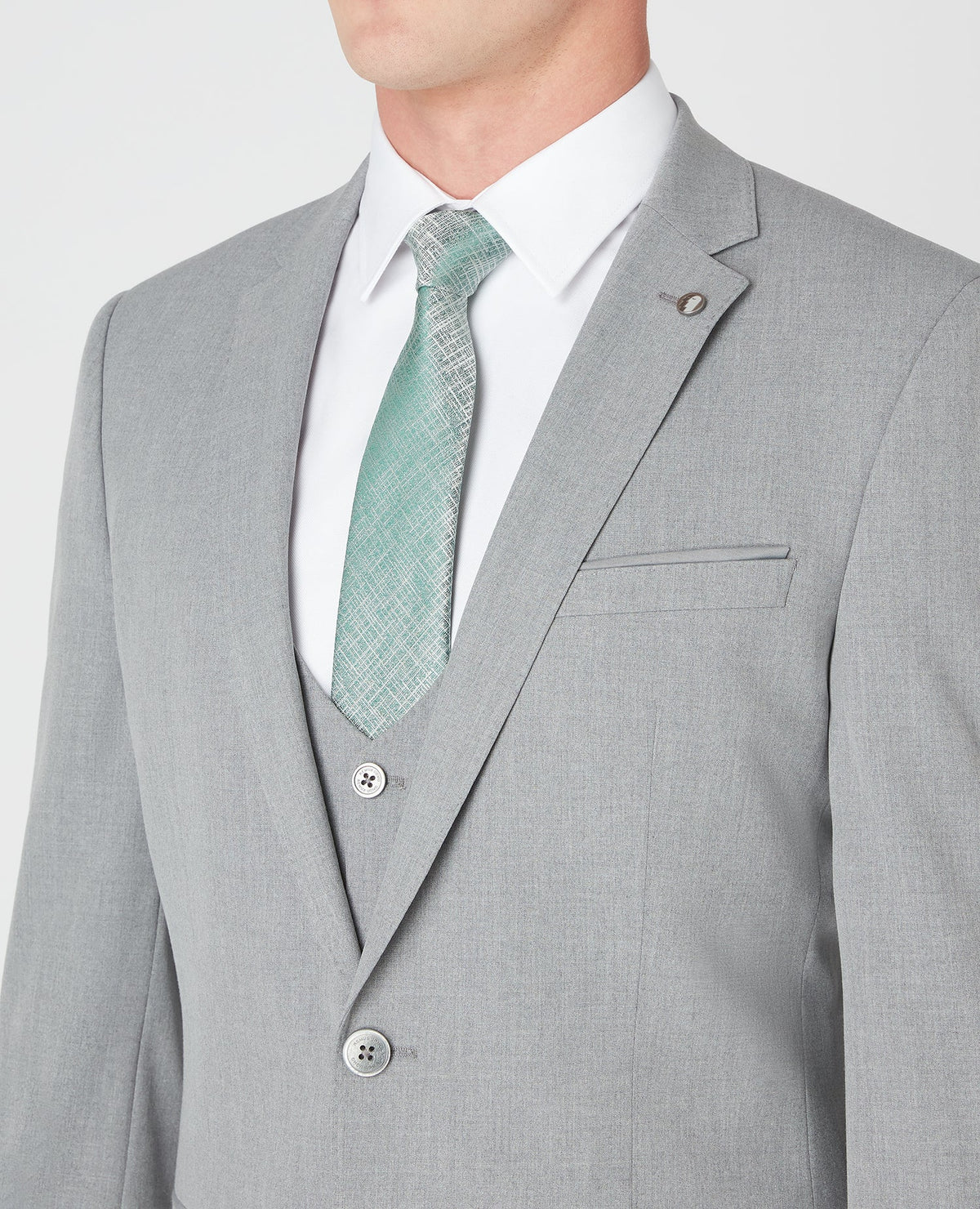 Man wearing a grey Slim Fit Stretch Mix and Match Suit Jacket
