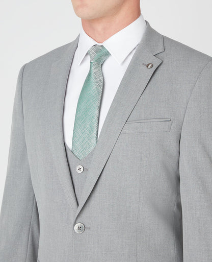 Man wearing a grey Slim Fit Stretch Mix and Match Suit Jacket