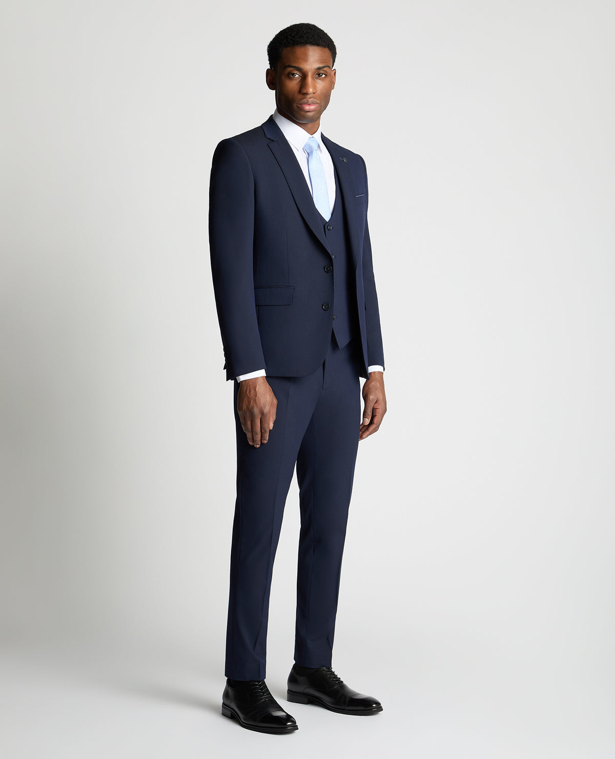 Man wearing a navy suit