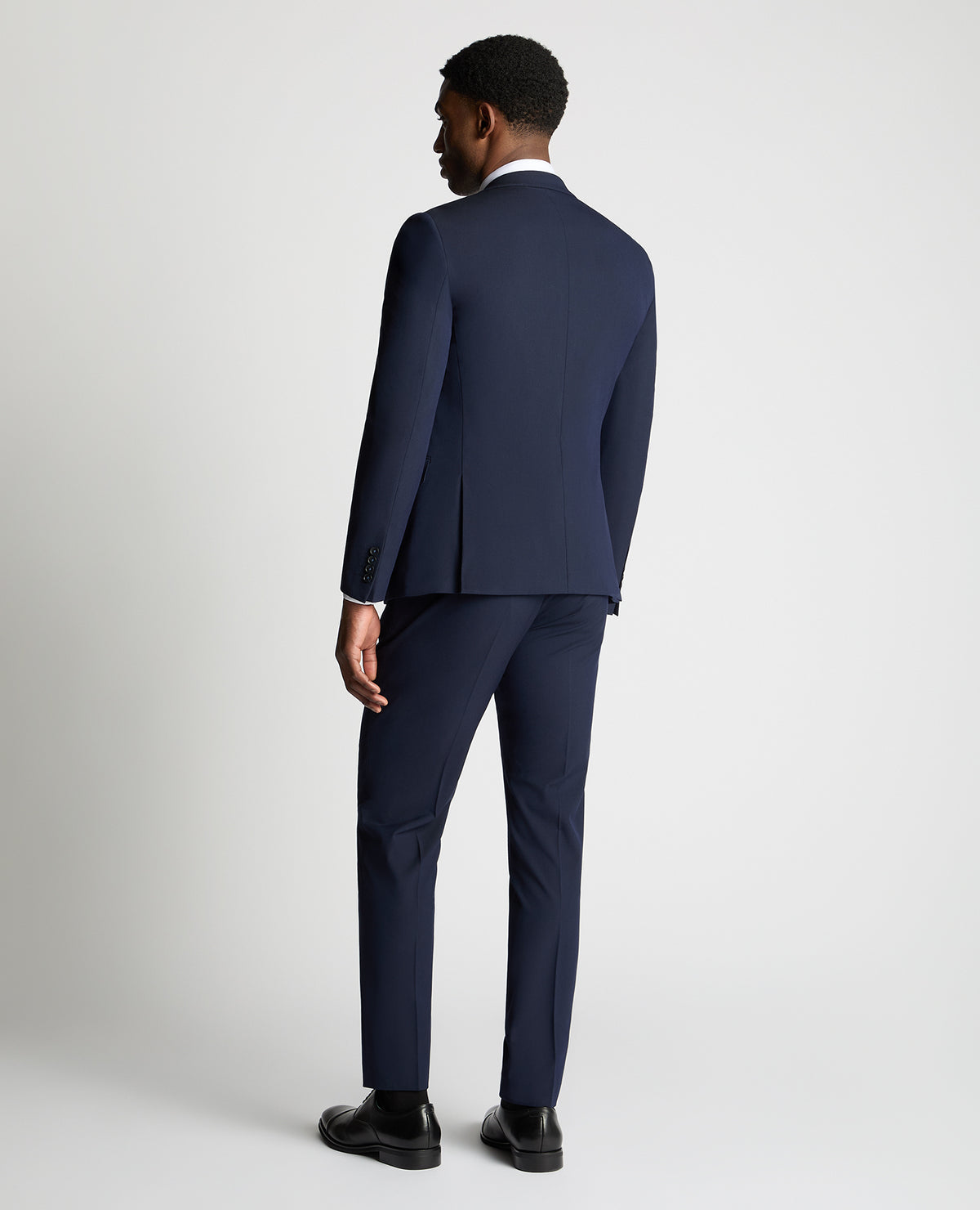 Man wearing a navy suit