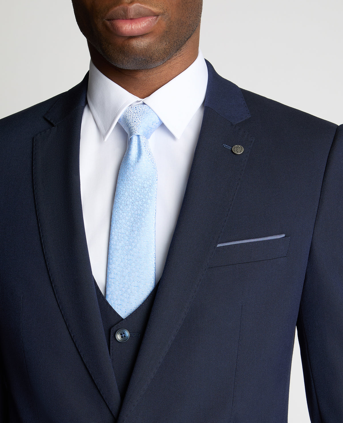 Man wearing a navy suit
